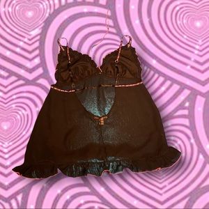 Black and pink chiffon and silky material w/ ruffles on the bottom baby doll top